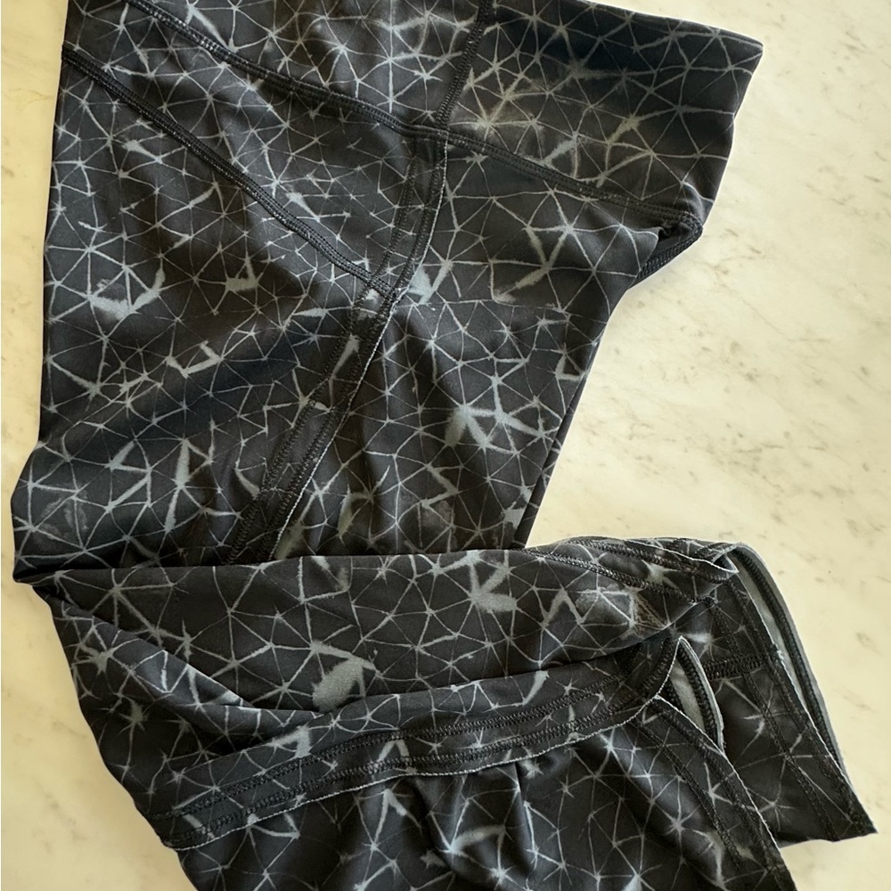 Lululemon Athletica Pedal Pace crop leggings “Star Crushed Coal black print”